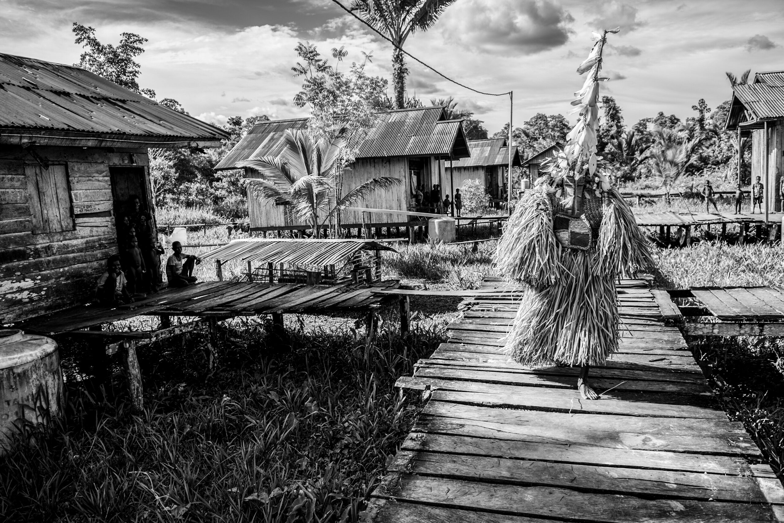 Ndoro walks through the village.