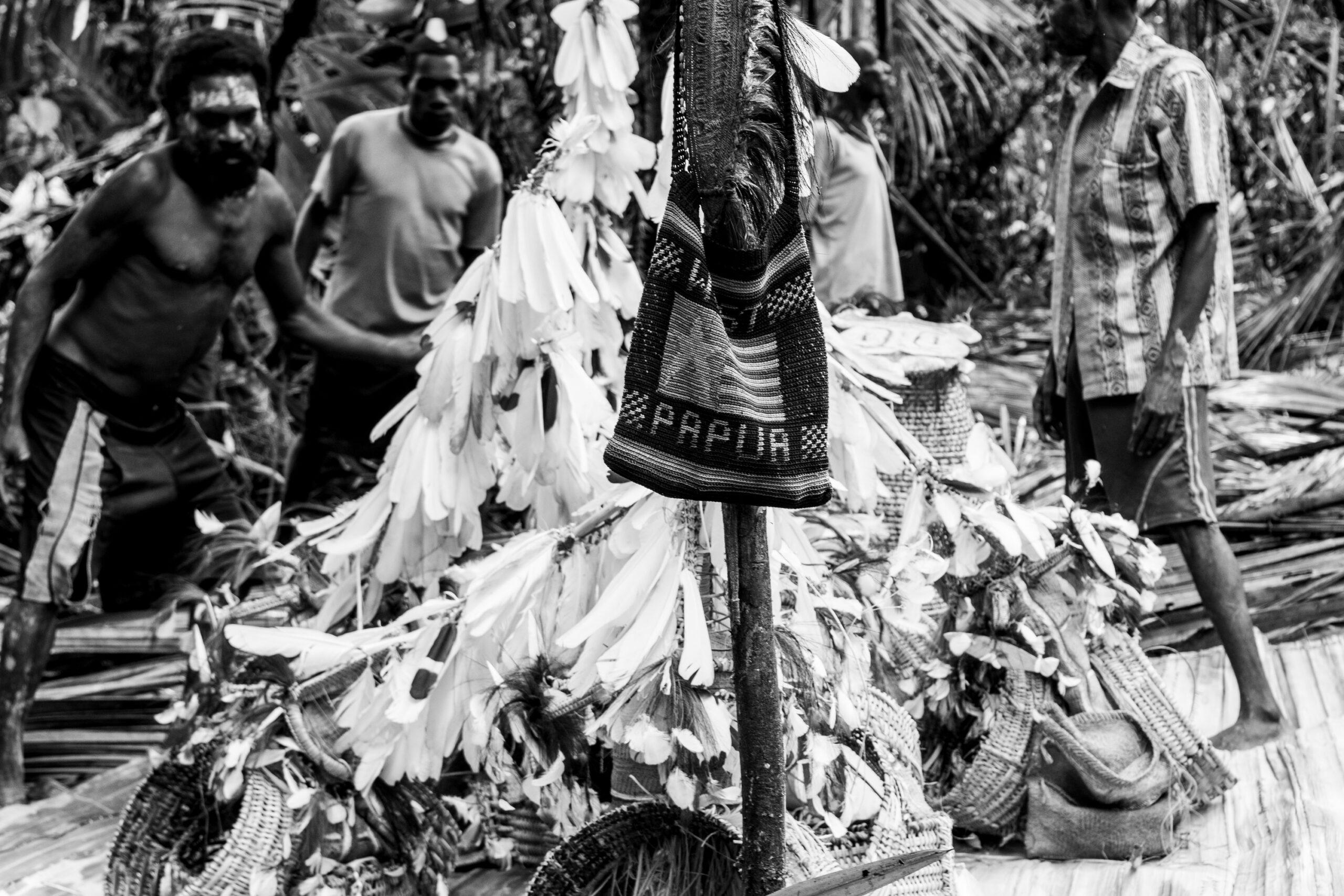 A Noken with the words, 'West Papua' belonging to Matias was hung near the spirit masks that would be prayed for.